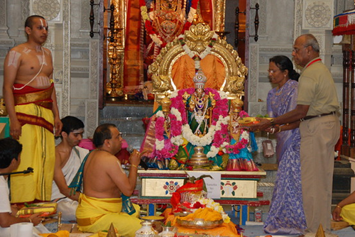 The subtle process in performing the ritual of 'Oti bharane' and its merits. What is the benefit in specific colour selection of the sari and blouse-piece offered to the Goddess?
